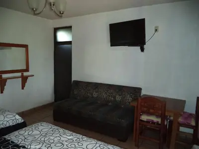 Cama o camas de una habitación en Hotel Ocampo