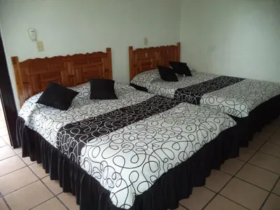 Cama o camas de una habitación en Hotel Ocampo