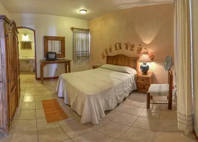 Cama o camas de una habitación en Hotel Posada Catarina