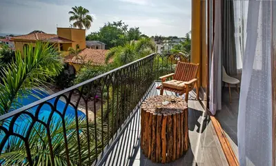 Un balcón o terraza de Suites La Hacienda