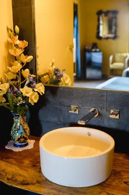 Cama o camas de una habitación en Suites La Hacienda