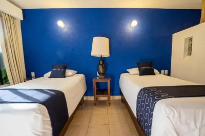 Cama o camas de una habitación en Hotel Mision, Acapulco centro