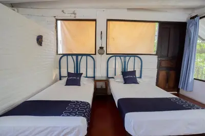 Cama o camas de una habitación en Hotel Mision, Acapulco centro