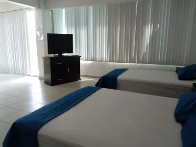 Cama o camas de una habitación en Posada San Cristobal