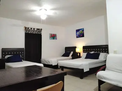 Cama o camas de una habitación en Posada San Cristobal