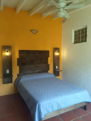 Cama o camas de una habitación en Posada Casa Topiltzin