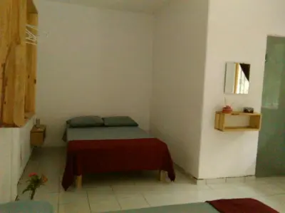 Cama o camas de una habitación en Posada Cielito Lindo