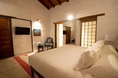 Cama o camas de una habitación en Quinta Ascensión Hotel Boutique Only Adults