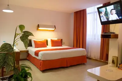 Cama o camas de una habitación en Hotel Enriquez