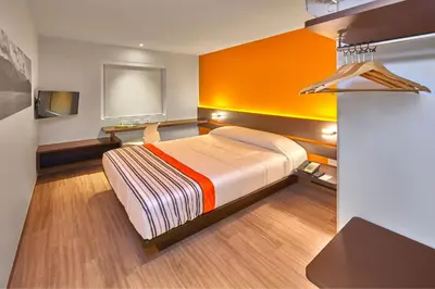 Cama o camas de una habitación en City Express Junior by Marriott Tuxtepec