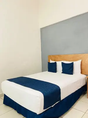 Cama o camas de una habitación en AM Amakal Hotel & Park
