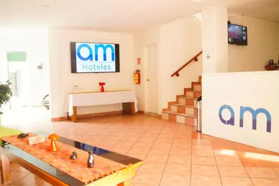 Una televisión o centro de entretenimiento en AM Amakal Hotel & Park