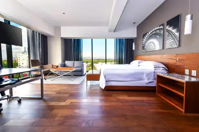Cama o camas de una habitación en Krystal Grand Suites Insurgentes