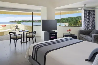 Cama o camas de una habitación en Dreams Huatulco Resort & Spa