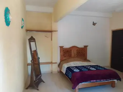Cama o camas de una habitación en Hotel Villas Monteli Suites Cuernavaca