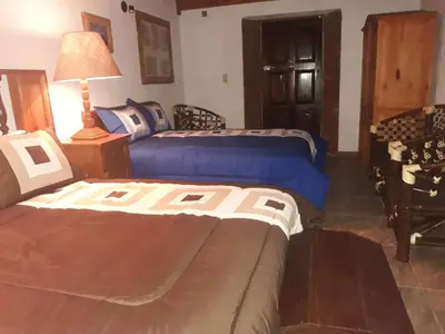 Cama o camas de una habitación en Hotel El Cristo