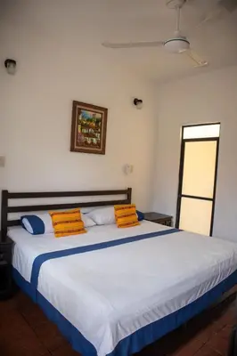 Cama o camas de una habitación en Hotel Casa Zoque Colonial