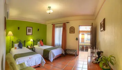Cama o camas de una habitación en Hotel Boutique Parador San Miguel Oaxaca