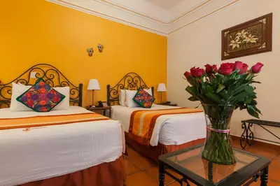 Cama o camas de una habitación en Hotel Boutique Parador San Miguel Oaxaca