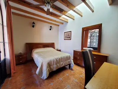 Cama o camas de una habitación en Villa Alfonsina