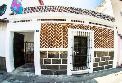Fachada o entrada de Gente de Más Bnb