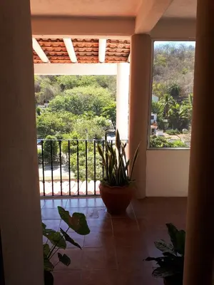 Un balcón o terraza de La Vivienda Villa