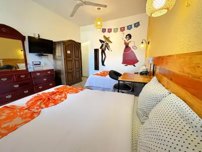 Cama o camas de una habitación en Hotel Escalada