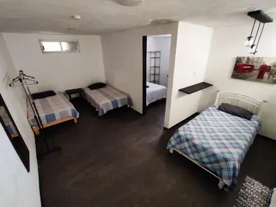 Cama o camas de una habitación en Hotelito Ejido
