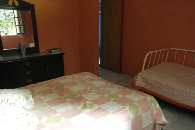 Cama o camas de una habitación en El Refugio de las Palomas