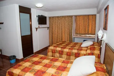 Cama o camas de una habitación en Hotel Symer