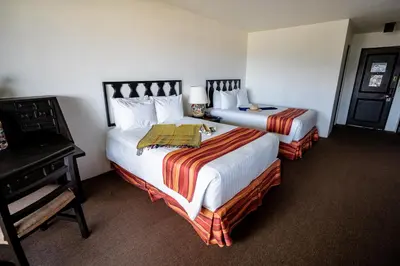 Cama o camas de una habitación en Hotel Victoria Oaxaca