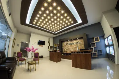Una televisión o centro de entretenimiento en Hotel Clipperton