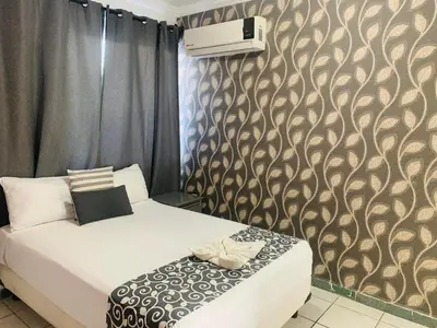 Cama o camas de una habitación en Hotel & Suites Bausan