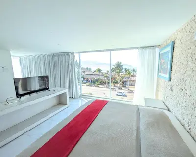 Cama o camas de una habitación en We Hotel Acapulco