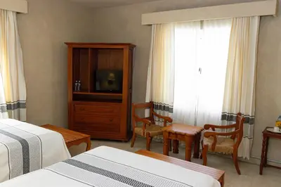 Cama o camas de una habitación en Hotel Marques Del Valle