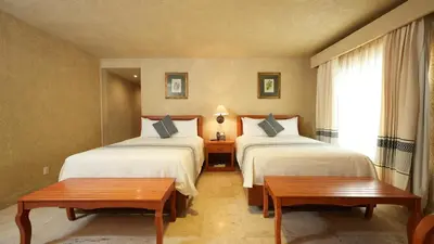 Cama o camas de una habitación en Hotel Marques Del Valle