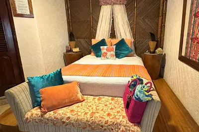 Cama o camas de una habitación en Casa Jaguar Hotel Boutique & Galería