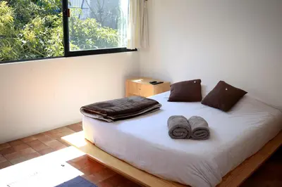 Cama o camas de una habitación en Coyoacan City Lofts