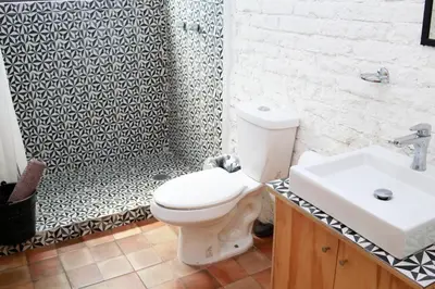 Un baño de Coyoacan City Lofts