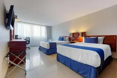 Cama o camas de una habitación en Hotel Hostal de Cortés