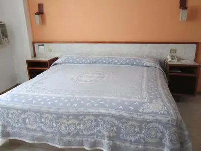 Cama o camas de una habitación en Hotel Baluarte