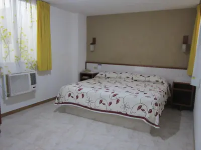 Cama o camas de una habitación en Hotel Baluarte
