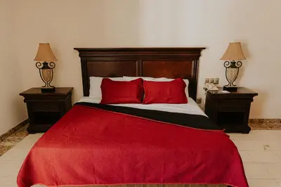 Cama o camas de una habitación en Gran Hotel Diligencias