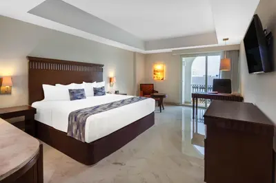Cama o camas de una habitación en Ramada Plaza by Wyndham Veracruz Boca del Rio