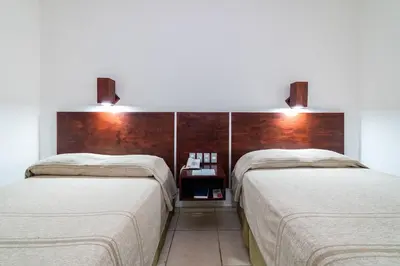 Cama o camas de una habitación en Hotel Castillo Huatulco & Beach Club