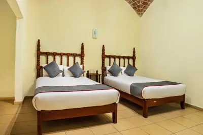Cama o camas de una habitación en Collection O Hotel Mocambo, Boca del Río