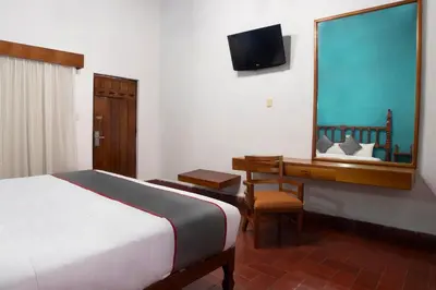 Cama o camas de una habitación en Collection O Hotel Mocambo, Boca del Río
