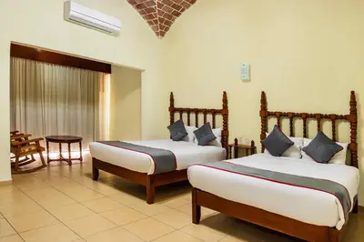 Cama o camas de una habitación en Collection O Hotel Mocambo, Boca del Río