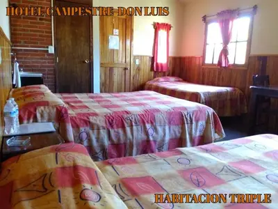Cama o camas de una habitación en Hotel Campestre Don Luis