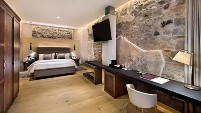 Cama o camas de una habitación en Cartesiano Boutique & Wellness Hotel